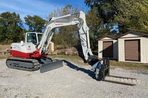 mini excavator with pallet forks