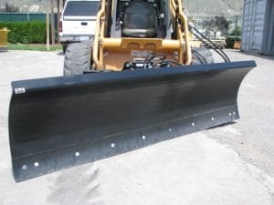 skid steer dozer blade mounted on Case Skid Steer