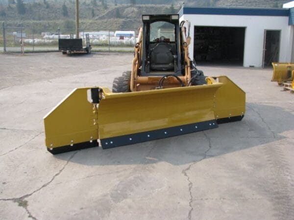 Blades-Snow-HLA-3230-2 HLA Snow Wing mounted on Case skid steer