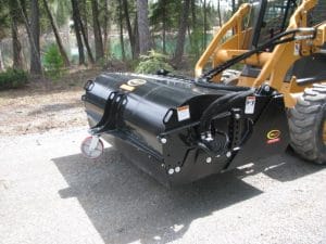 Erskine pick up broom mounted on a Case skid steer