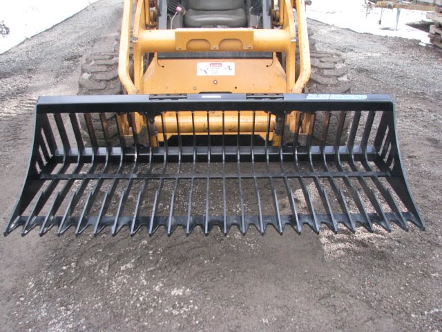 Rock Grapple attached to Skid Steer