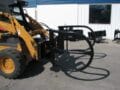HLA bale grapple mounted on skid steer