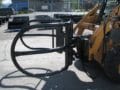 HLA bale grapple mounted on skid steer