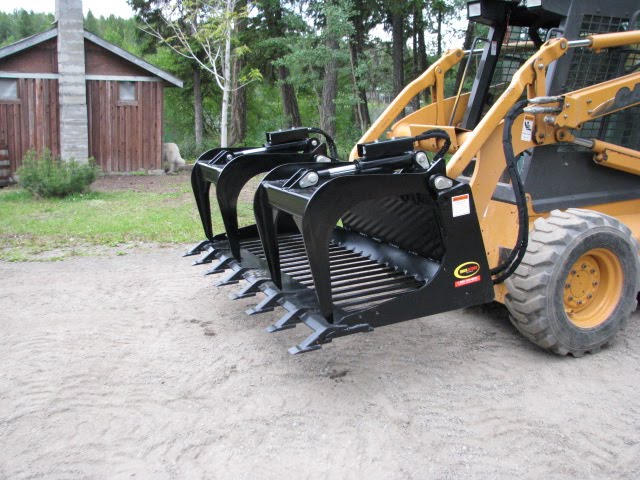 Erskine Rock Bucket Grapple attached to Skid Steer