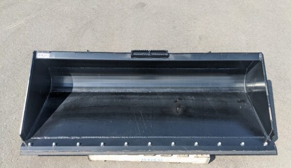 HLA low profile skid steer bucket 84" with BOE HLA low profile bucket heavy duty 84" with bolt on cutting edge front view