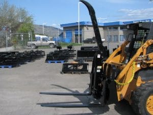 HLA Single Arm Grapple mounted on Case skid steer