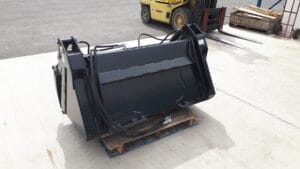 Skid steer bucket with grapple