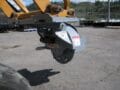 Skid steer mounted stump grinder