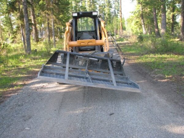 Tilting-Plates-4 Blue Diamond Land Plane mounted on skid steer