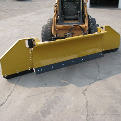 HLA wing blade angled and mounted on Case skid steer