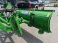 HLA 2000 series 90" snow blade with JD440/540 quick attach mounted on JD tractor side view