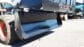 Skid Steer 4 in 1 Bucket in open position mounted on Bobcat