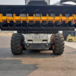 Erskine rototiller mounted on skid steer