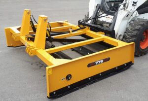 Land Plane with rippers mounted on Bobcat skid steer