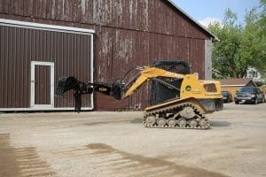 Skid Steer Backhoe HLA brand mounted on an ASV RC-50