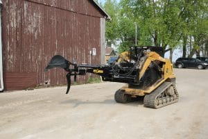 Skid Steer Backhoe HLA brand mounted on an ASV RC-50