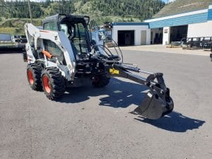 Skid Steer Backhoe mounted on bobcat