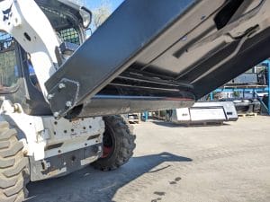 Martatch brush mower mounted on Bobcat skid steer underside view