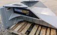 skid steer mounted tree scoop side view