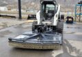 MK Martin Skid Steer Rotary Cutter on a skid steer