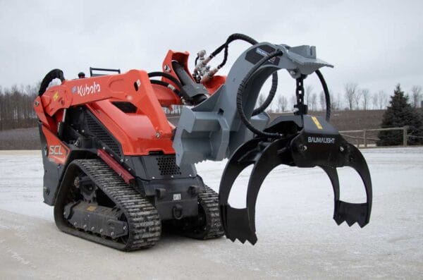 Mini skid steer with log grapple